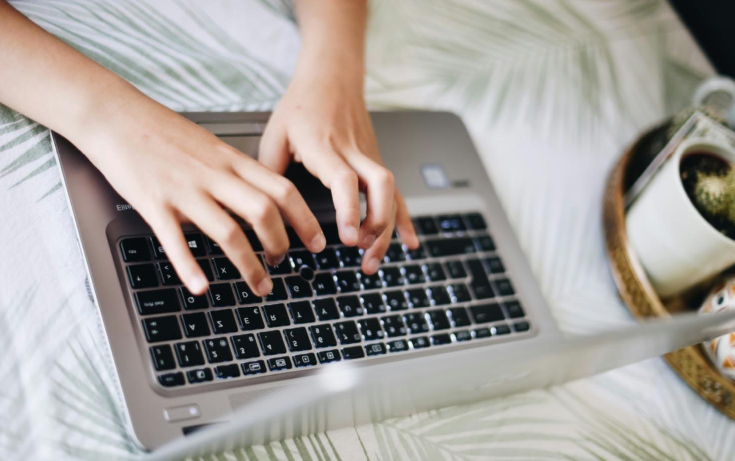 Technical team reviewing disaster recovery documentation and testing backup systems in server environment